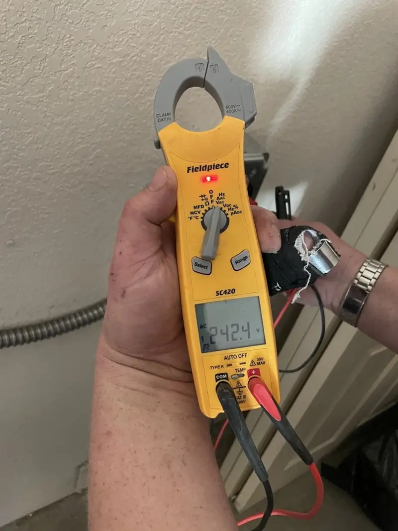 Voltage testing with clamp meter during Aluminum Wiring Replacement in Clifton